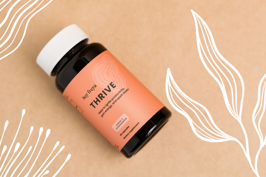 Hey Freya’s THRIVE supplement with five benefits in one bottle on a peach background
