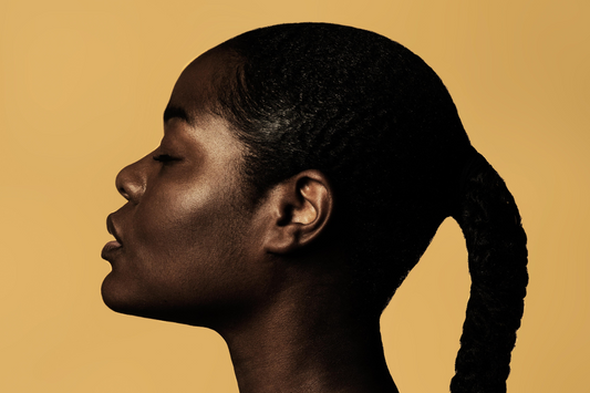 Side Profile of Woman with Radiant Glowing Skin.