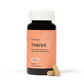THRIVE Women’s Stress and Wellness Formula: A holistic blend of 20 ingredients for stress relief, hormone balance, mental clarity, and vitality. A dark salmon label on an amber bottle standing upright against a white background with a daily dose of two hey freya capsules placed in front of it.